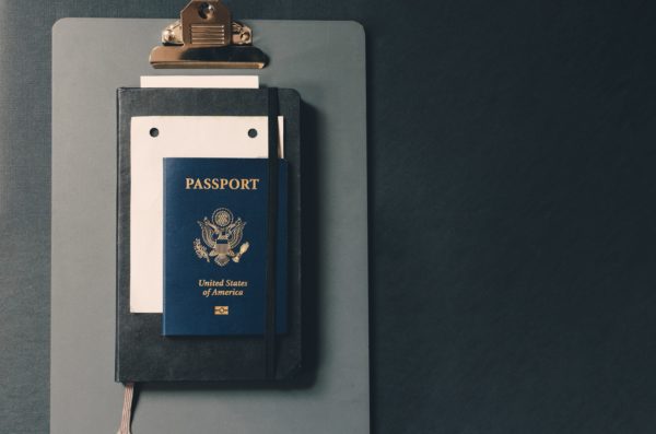 passport on clipboard