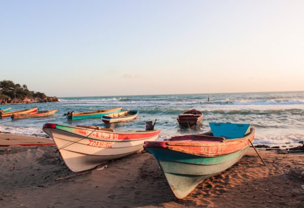 boats on beach in Jamaica