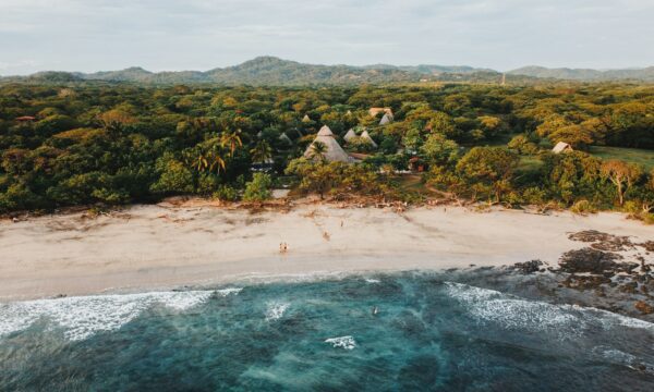 beach area of costa rica with hills in the background