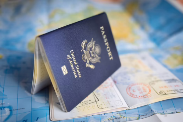 passport sitting on a map