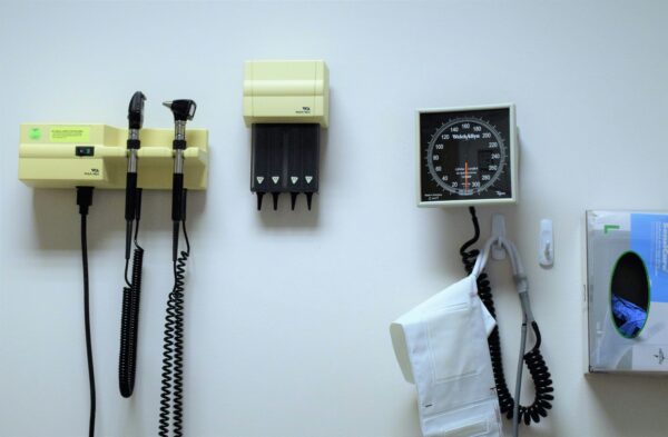 medical tools on white wall