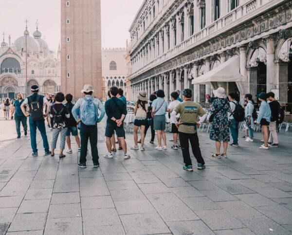 group of travelers looking at an attraction